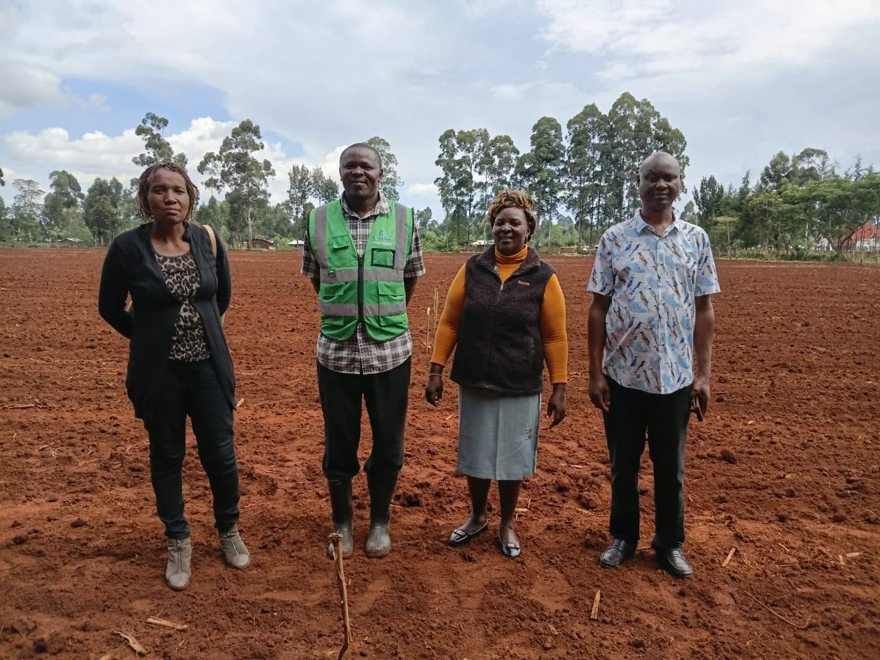Field Coordinators on Prepared Farm Land